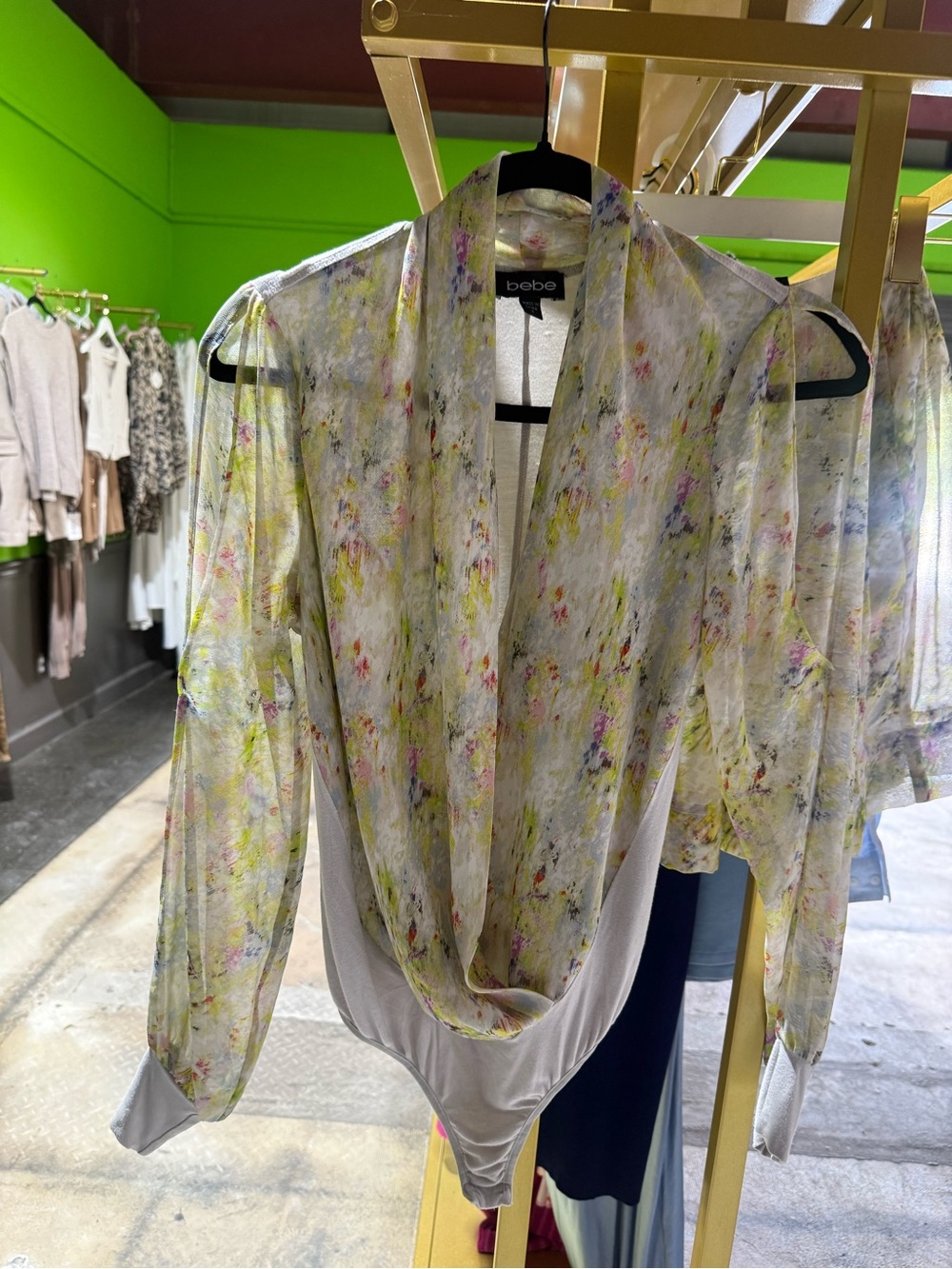 bebe Sheer Floral Draped Bodysuit in Light Gray with Pastel Accents